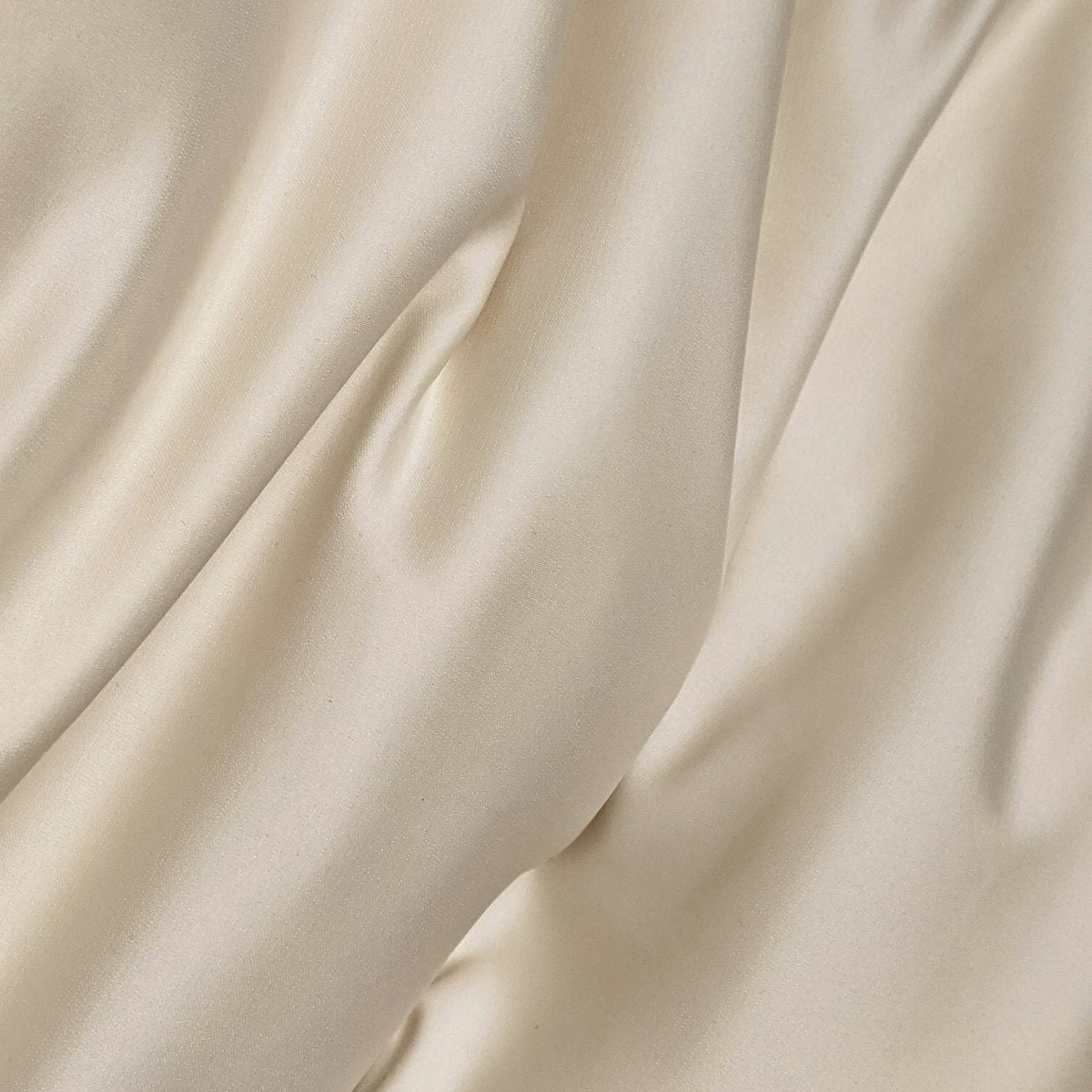 Charmeuse Silk — Pearl White, folded fabric
