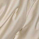 Charmeuse Silk — Pearl White, folded fabric